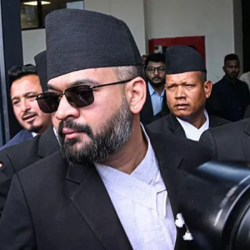 Nepal swears in ex-rapper as new prime minister