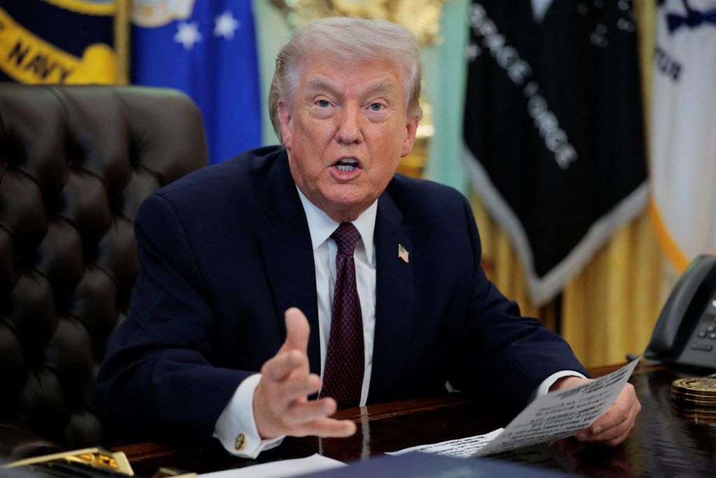 U.S. President Donald Trump speaks during the signing ceremony for an execituve order on mail ballots, in the Oval Office of the White House in Washington, D.C., March 31, 2026.  REUTERS/Evan Vucci